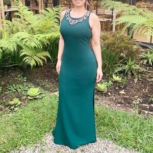 Elegant Green Sleeveless Dress with Embellished Neckline